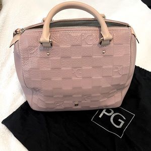 Purificación Garcia. Made in Spain. Pure leather. Mauve color.